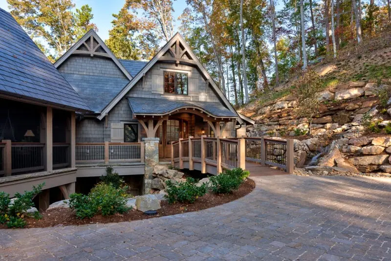Lake Keowee House with a bridge in its landscaping