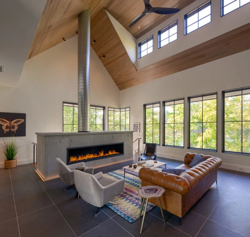 Modern living room with beautiful furniture and fireplace