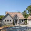 Custom home on lake with detached garage