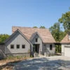 Custom home on lake with detached garage