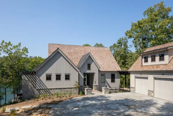 Custom home on lake with detached garage