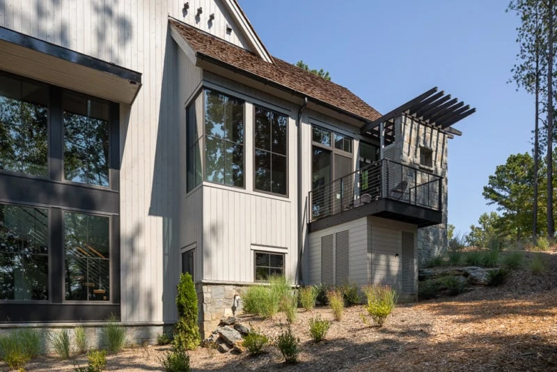 Back of custom house with windows and landscape