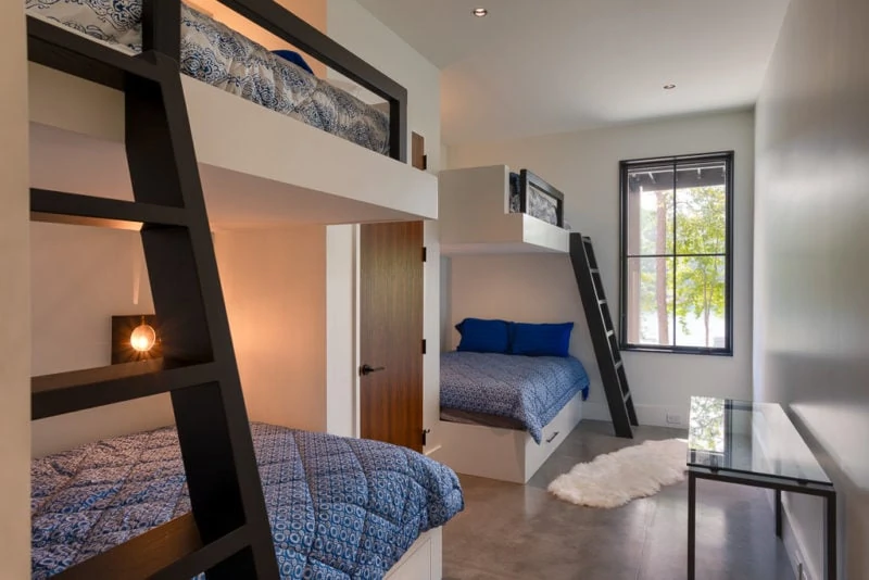 Bedroom with two sets of built in bunk beds