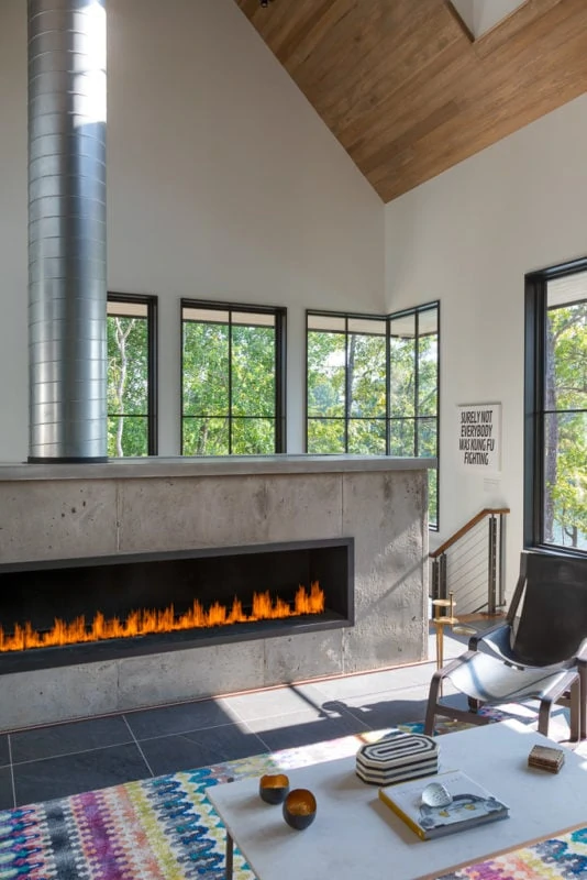 Colorful rug with lit fireplace