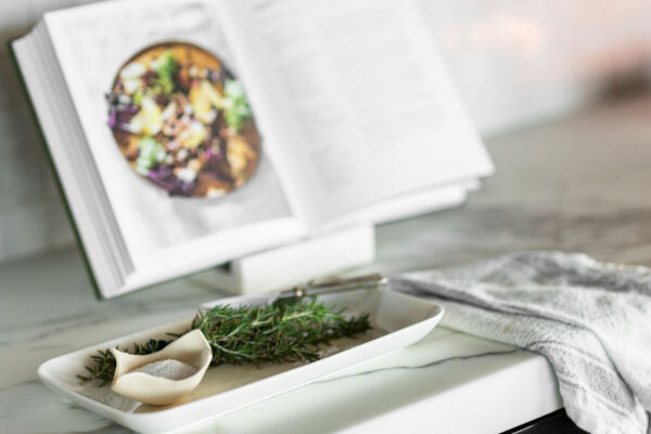 image of kitchen counter with a cookbook on top