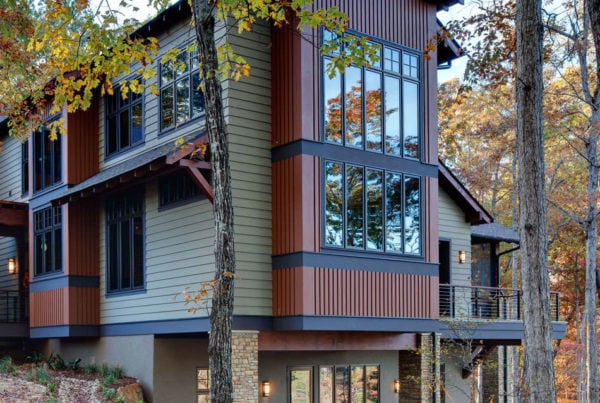 side view of house with large two story window