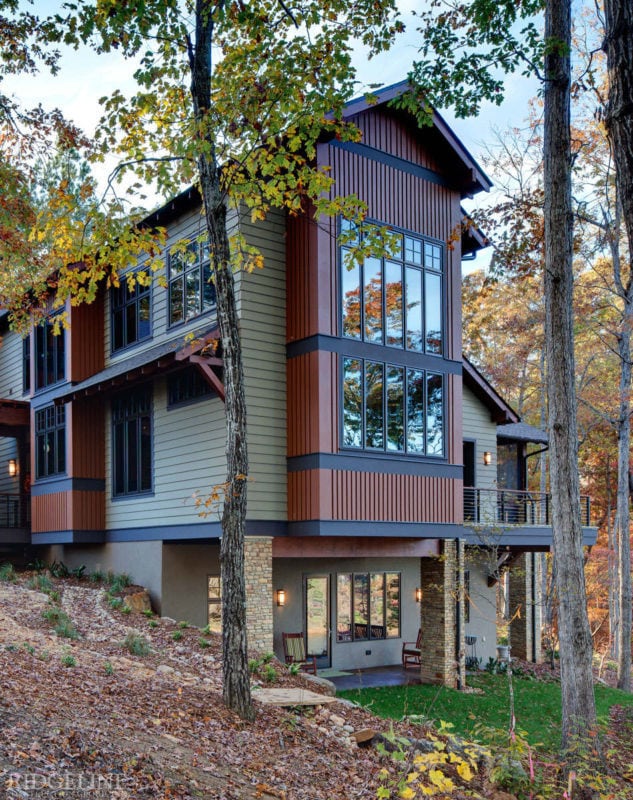 side view of house with large two story window