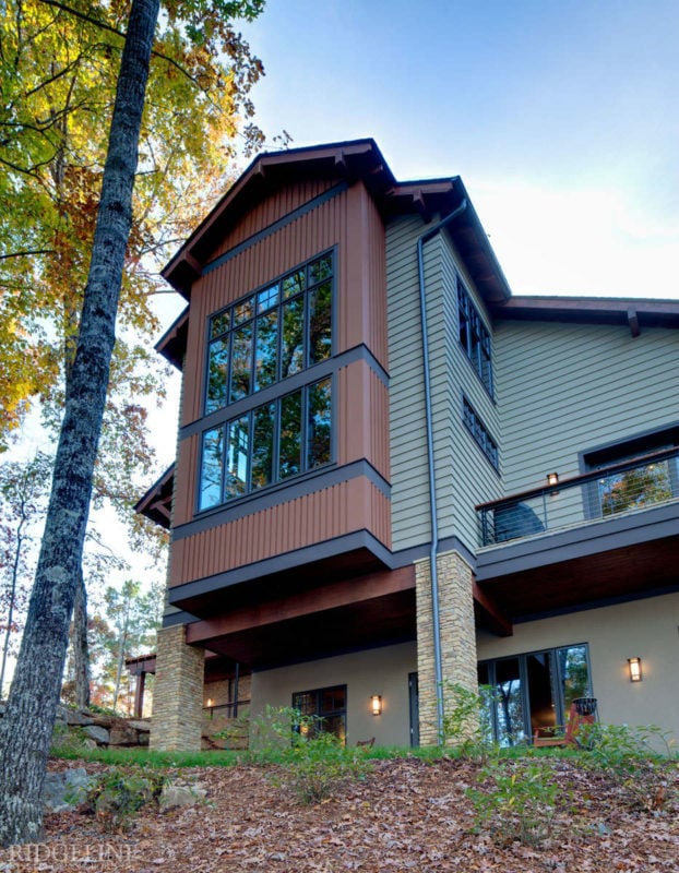 side view of house with large two story window