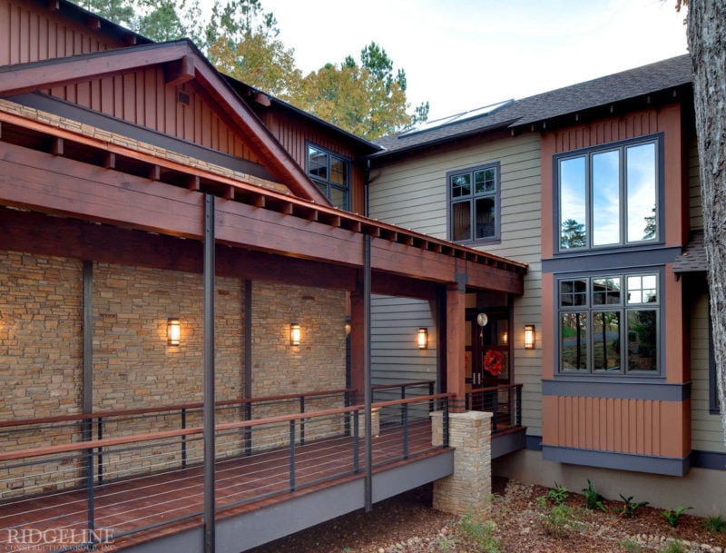 side view of covered walkway leading up to front doors