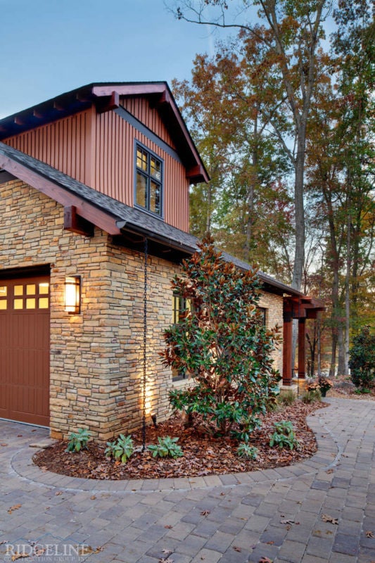 partial view of drive way and garage door