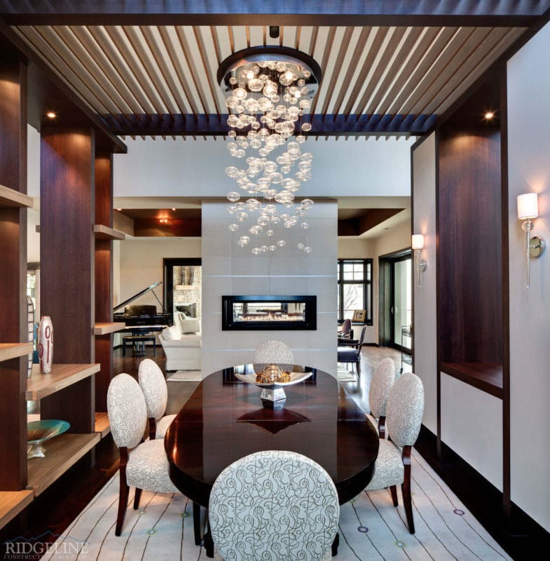 elegant dining room table with with bubble chandelier