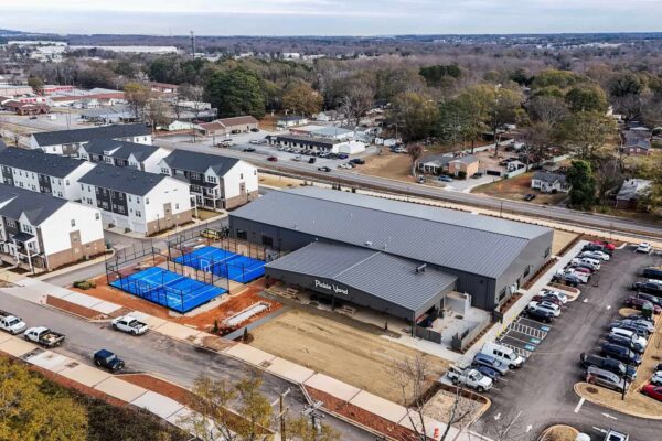 drone image above Pickle Yard featuring the outdoor courts and entire facility