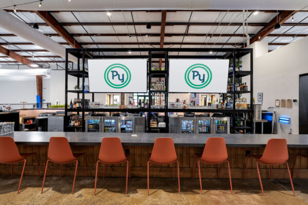 bar at pickleyard with televisions