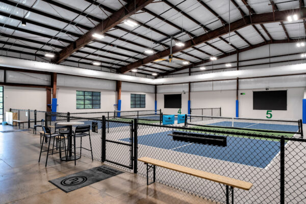 two inside pickleball courts at pickleyard