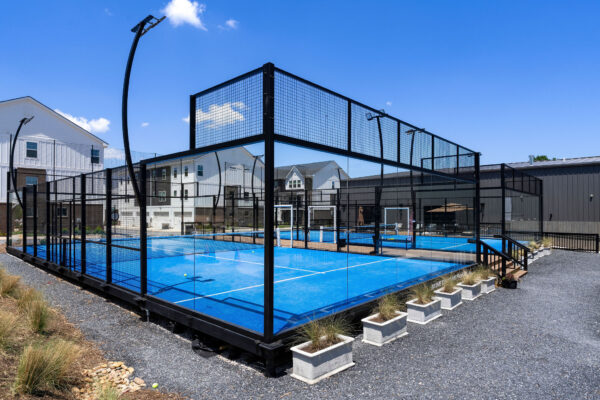 side view of the outside blue pickle ball courts