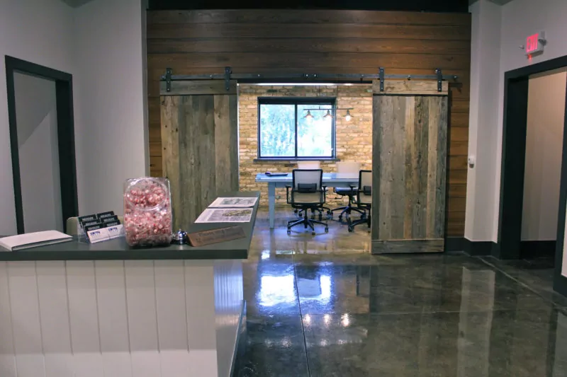 Office with wooden barn doors