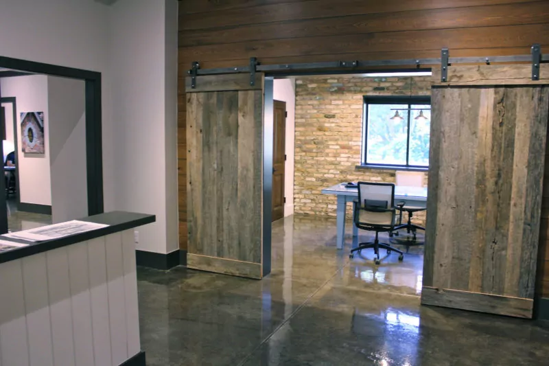 Office with wooden barn doors