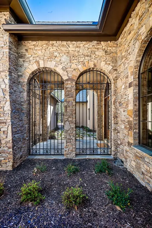 Outside Walkway With Gated Doorways