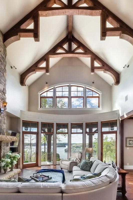 lake house living room with tall ceilings