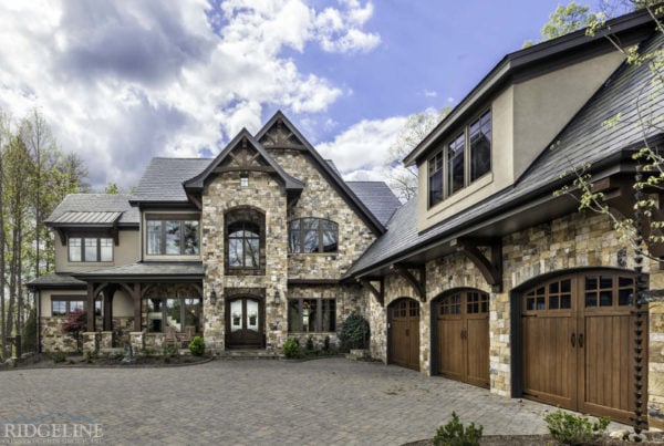 mountain home with brown, white and black stonestone facade