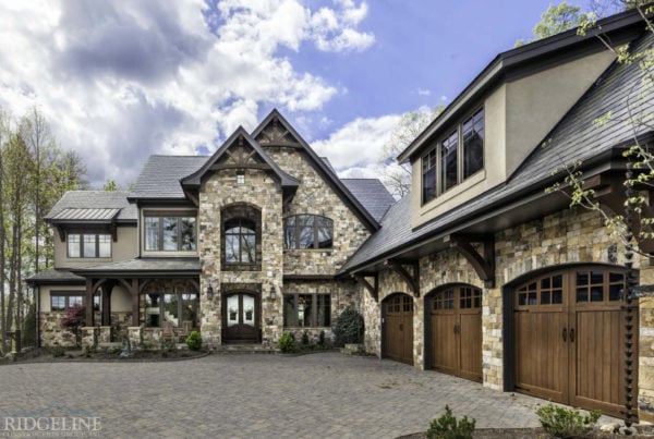 mountain home with brown, white and black stonestone facade