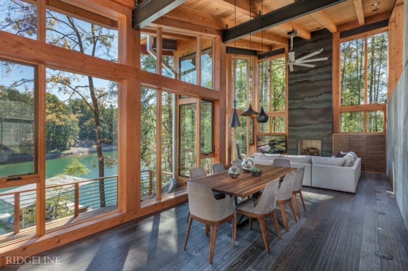 modern mountain residence with lots of windows and high ceilings