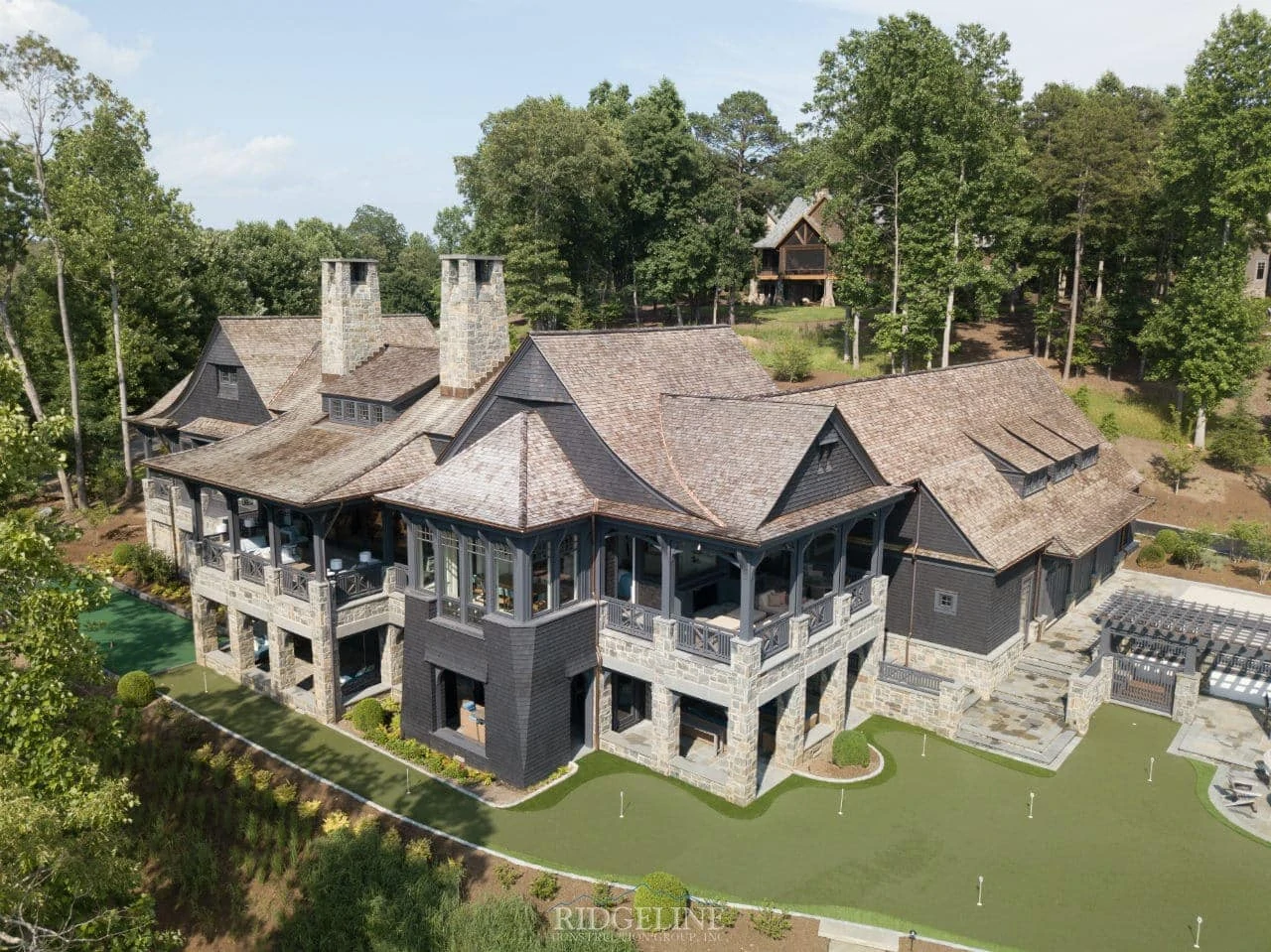 Bird's-eye view of a custom home, built on a put-put course