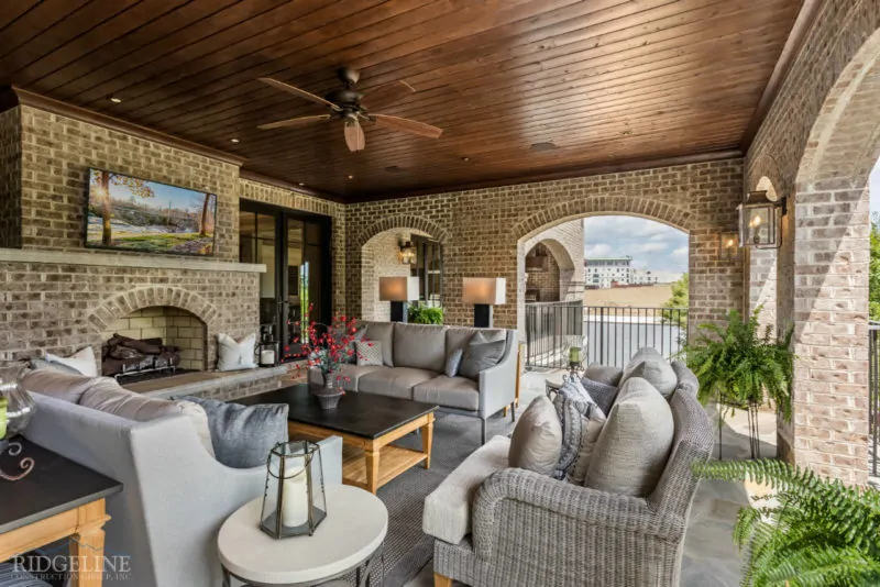 outdoor patio and furniture at a custom lakefront home
