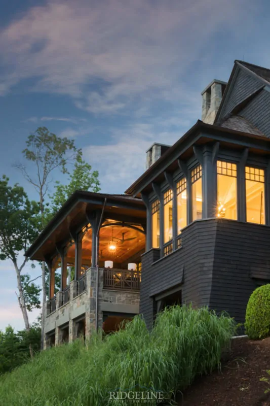 the cliffs mansion with lights on