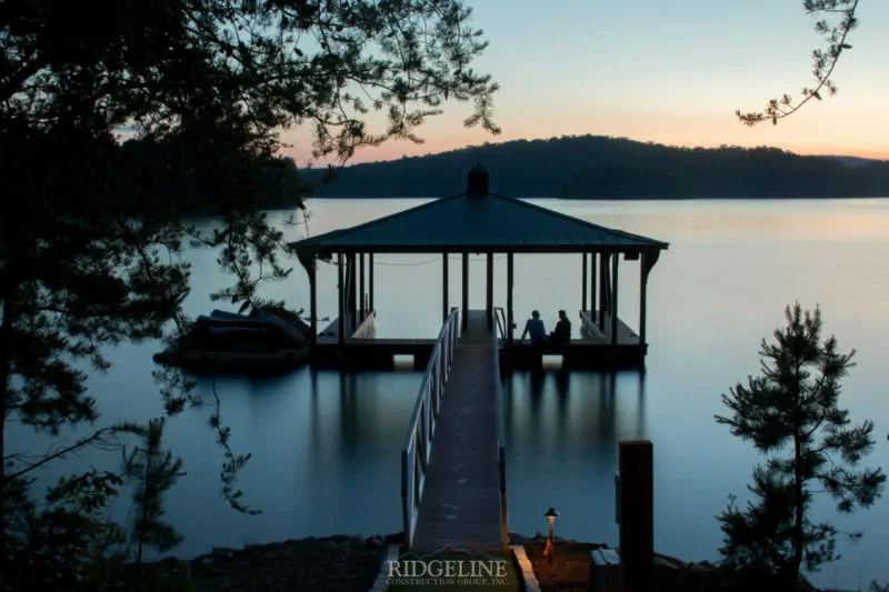 dock in lake at sunset