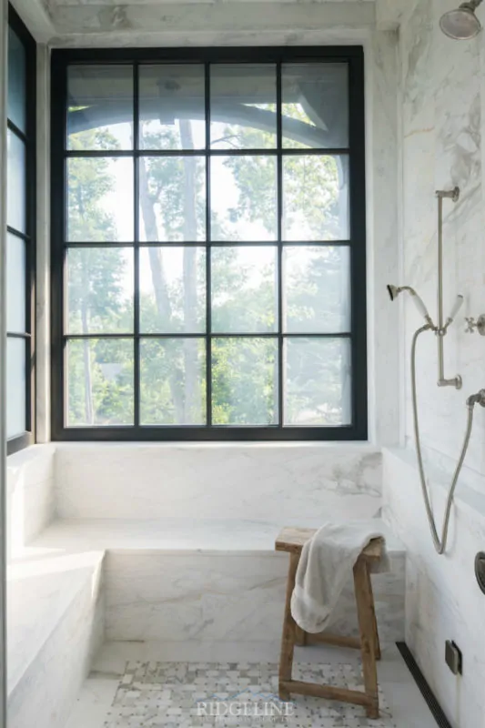 walk in shower with windows and built in bench