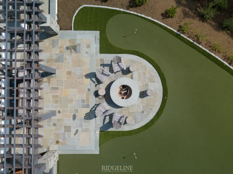 aerial view of fire pit and putting green