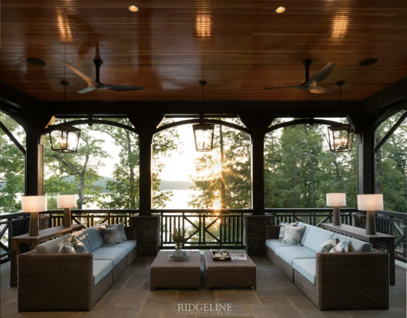 Outdoor patio with seating overlooking the lake