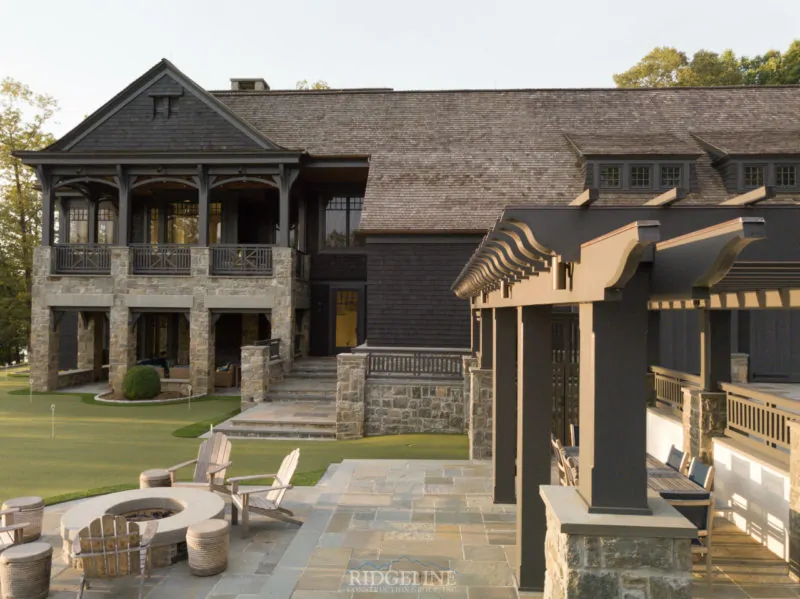 mansion with putting green and fire pit
