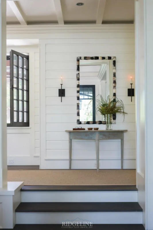 home interior with pretty mirror and open windows
