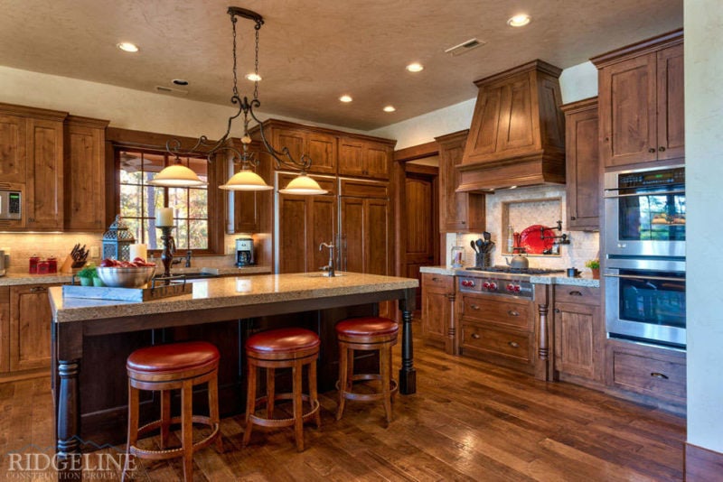 Kitchen area with wood floors and natural colored cabinets