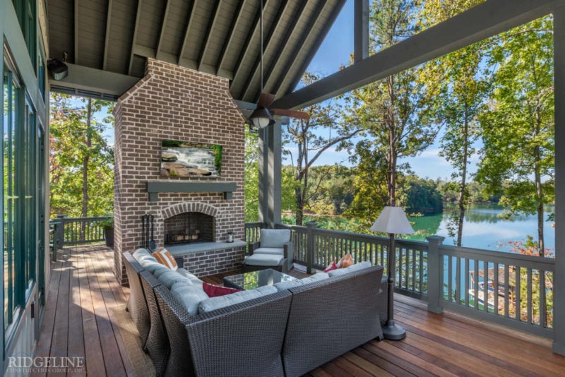 outdoor patio with furniture and lake