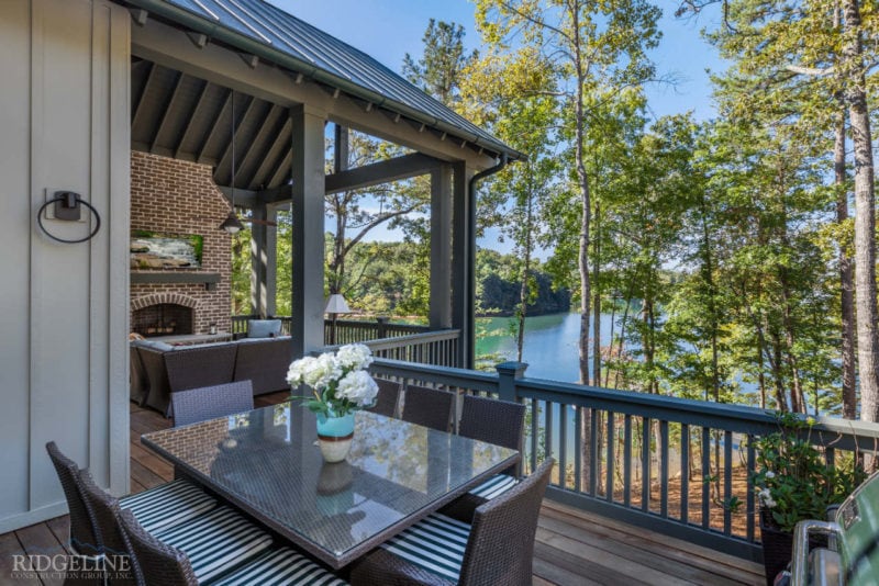 outdoor patio with furniture and lake