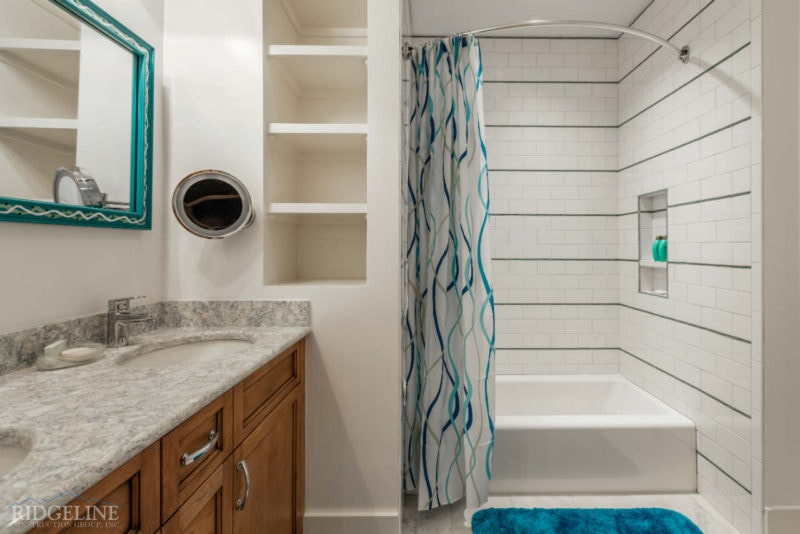 white bathroom with blue accents