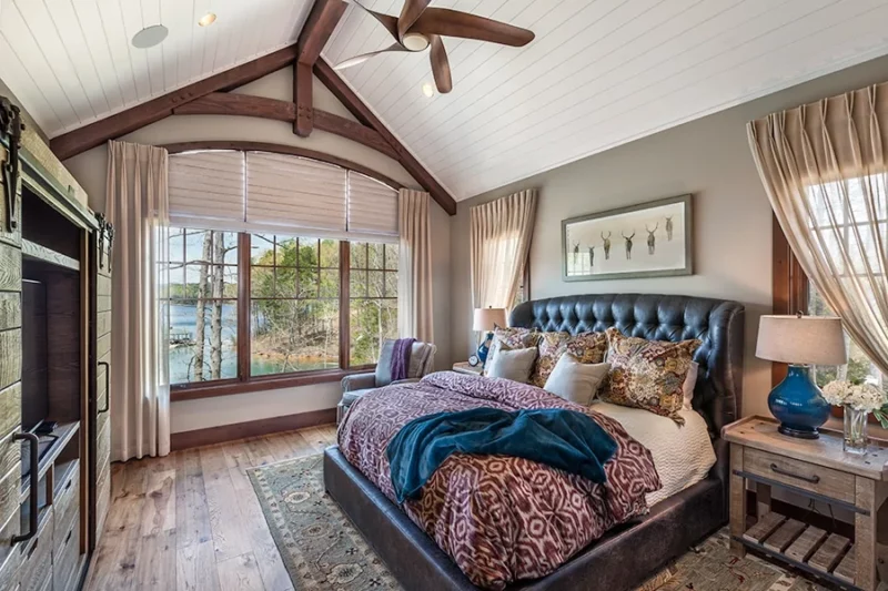 Bedroom with window shades.