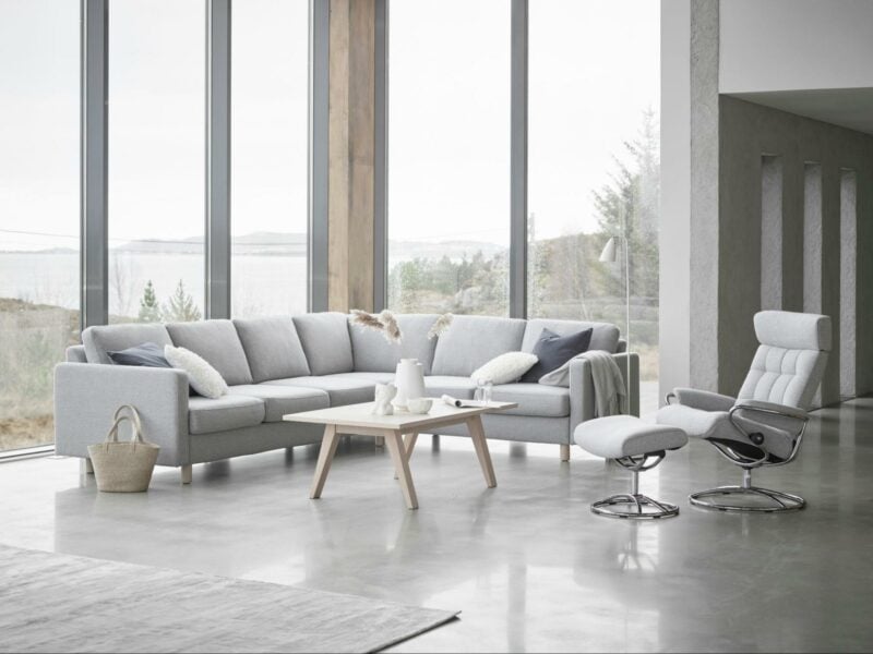 Grey living room overlooking lake