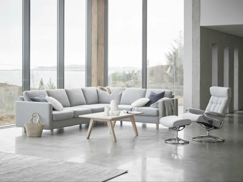 Grey living room overlooking lake