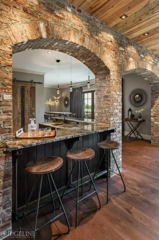 brick facade over kitchen with marble countertops