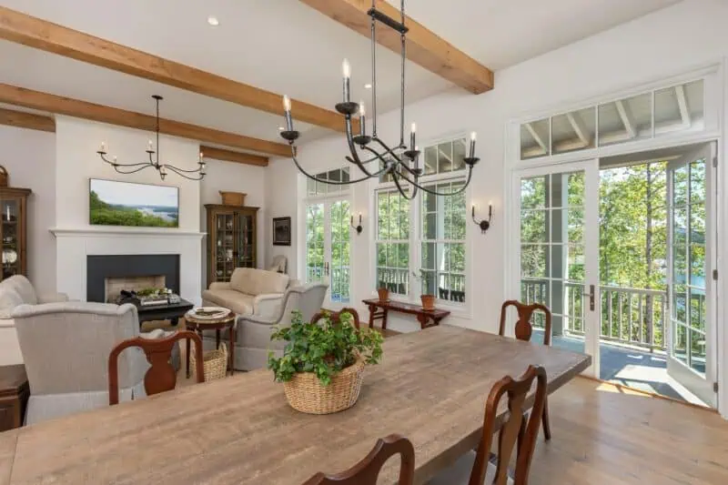 Large windows and French doors in an open concept living room